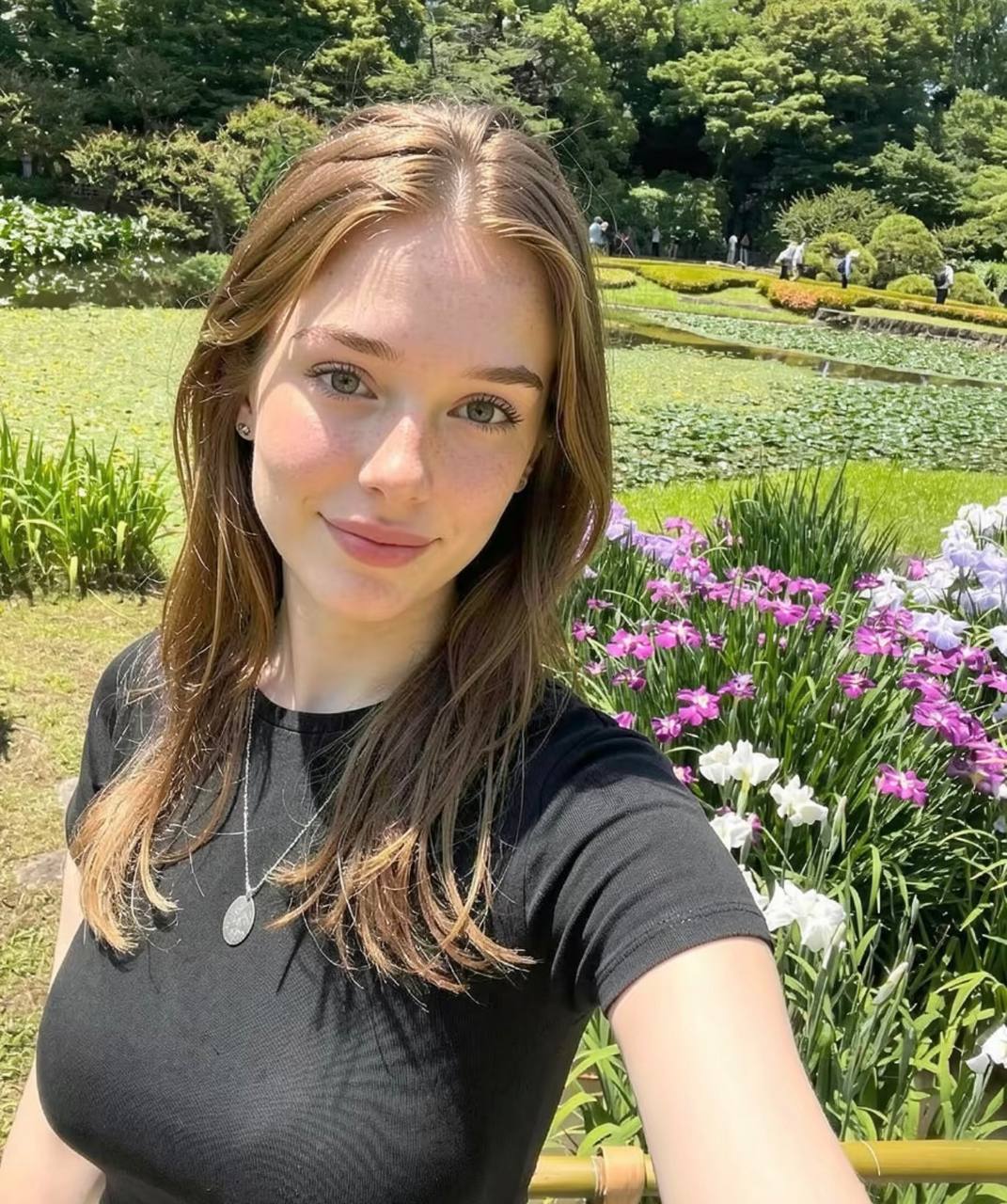 Woman visiting a flower garden